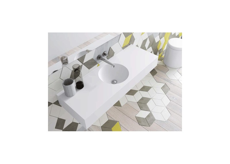 Lavabo solid surface con faldón con lavabo redondo