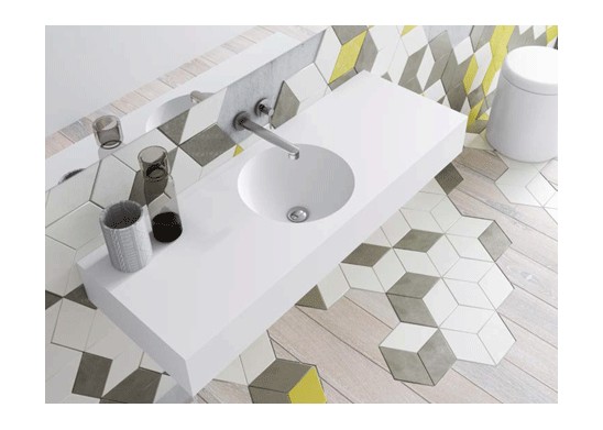 Lavabo solid surface con faldón con lavabo redondo